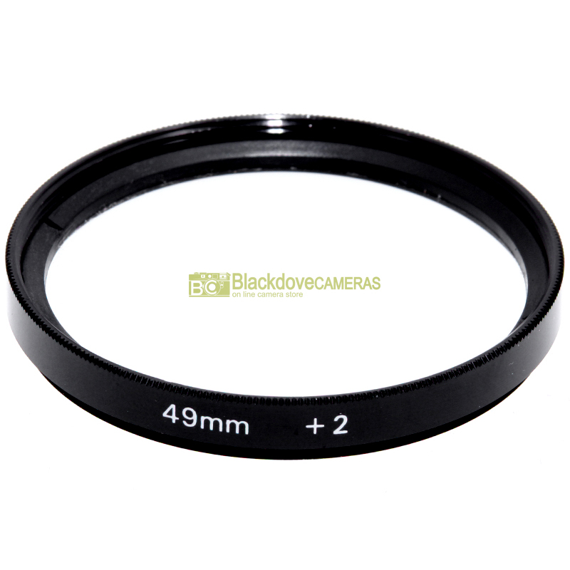 “49mm. aggiuntivo macro +2 diottrie per obiettivi con vite M49. Close-up adapter.”