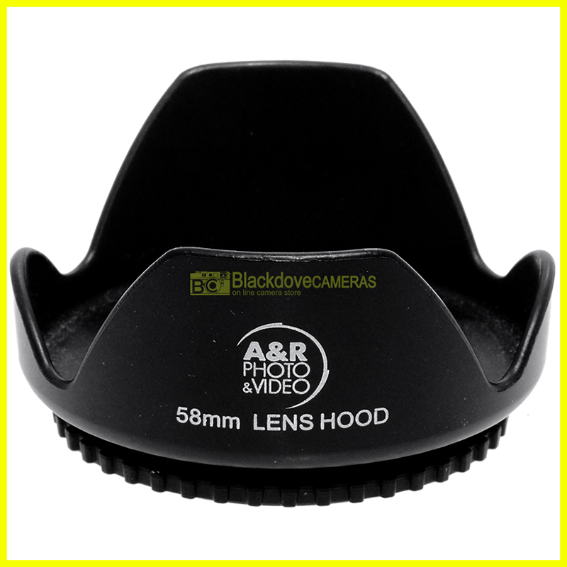 “58mm. paraluce a corolla universale, innesto a vite. Ruotabile. Lens hood.”